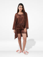 Woman wearing a brown loungewear set on a white background
